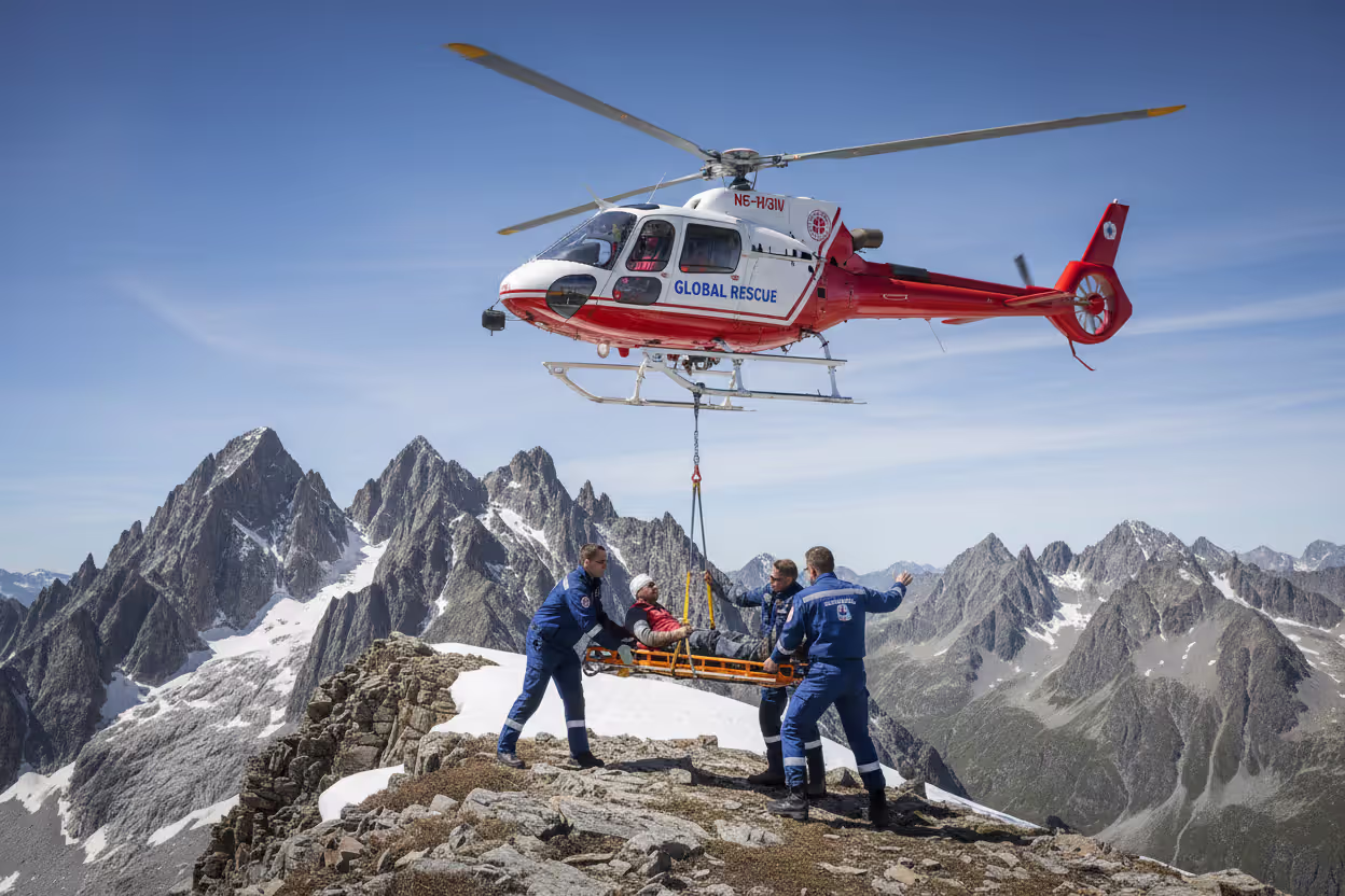 Medical evacuation helicopter assisting an injured traveler in a remote area